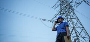 utility worker near powerlines